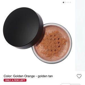 Anastasia Beverly Hills loose setting powder in shade golden orange.